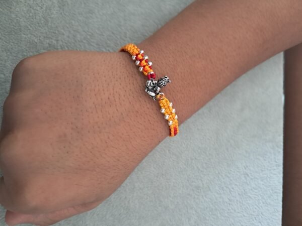 "Premium silver rakhi for brother – Pure silver with detailed craftsmanship"