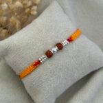 Silver Rudraksha Rakhi with Diamond-Cut CNC Silver Bead