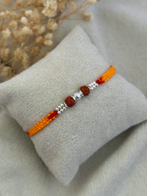 Silver Rudraksha Rakhi with Diamond-Cut CNC Silver Bead