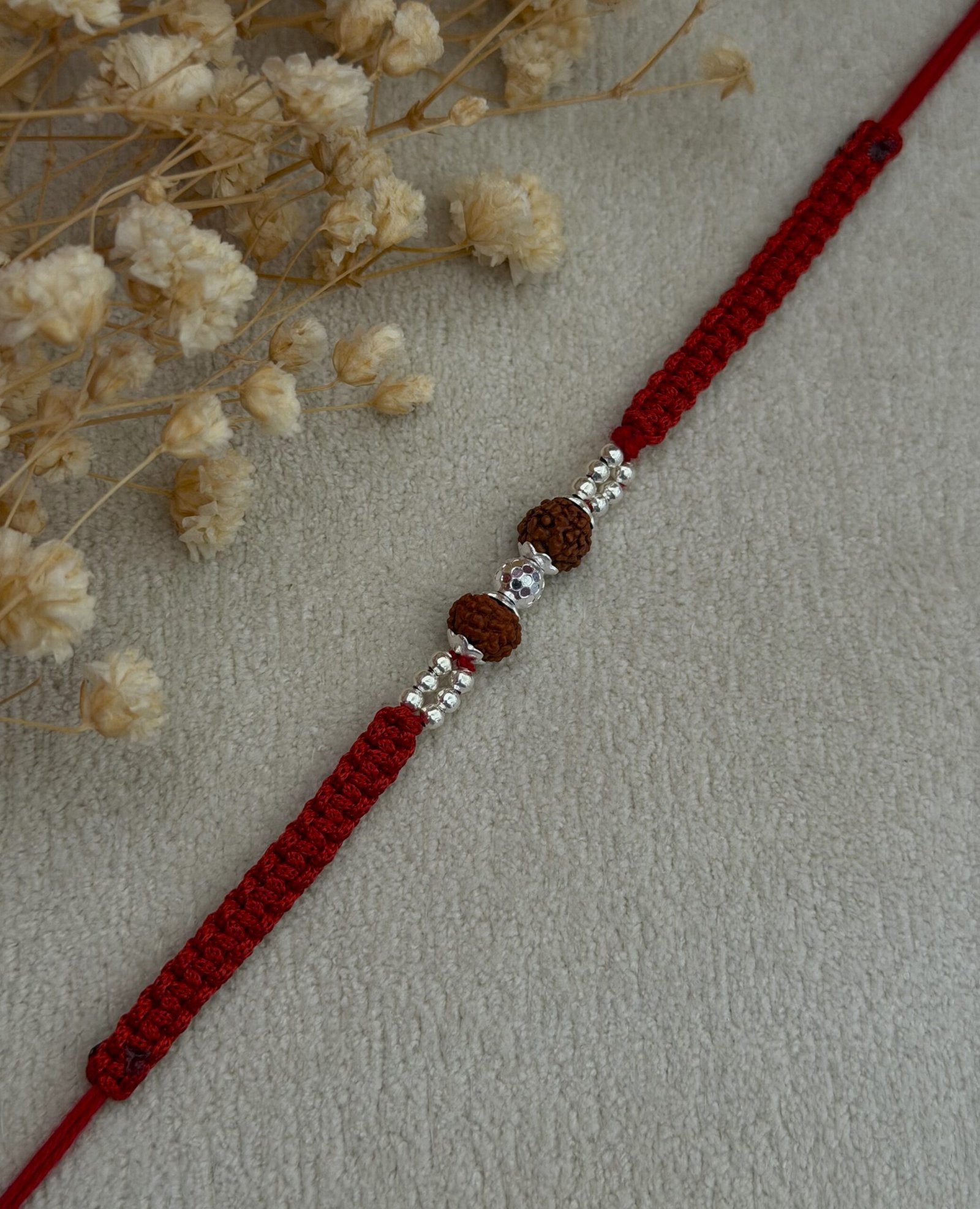 Rudraksha Rakhi with Diamond-Cut CNC Silver Bead red - Image 4