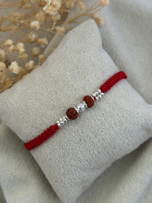 Rudraksha Rakhi with Diamond-Cut CNC Silver Bead red
