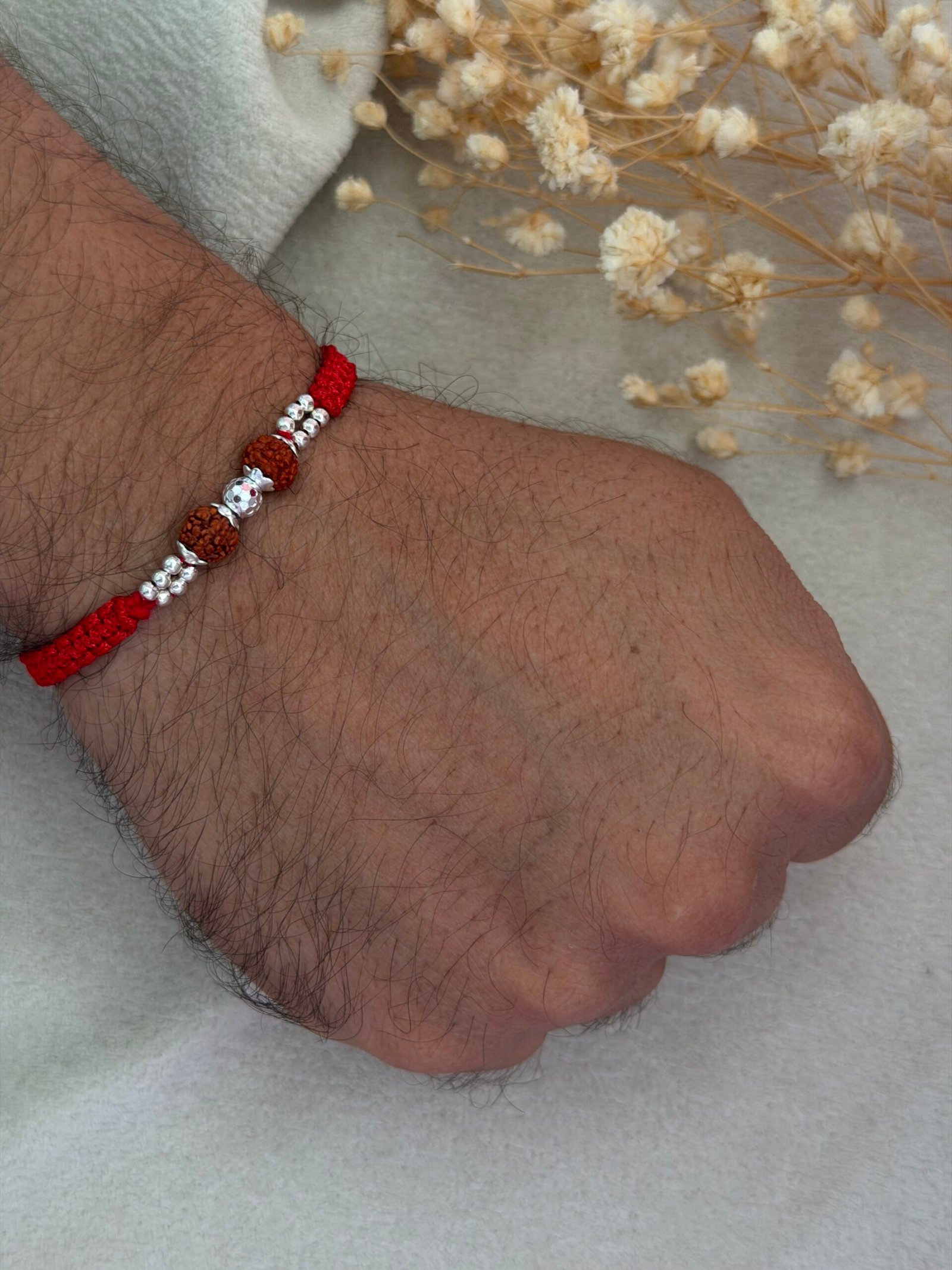 Rudraksha Rakhi with Diamond-Cut CNC Silver Bead red - Image 2