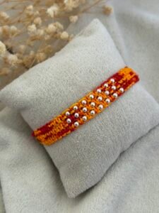 22 ball wide strip red silver rakhi