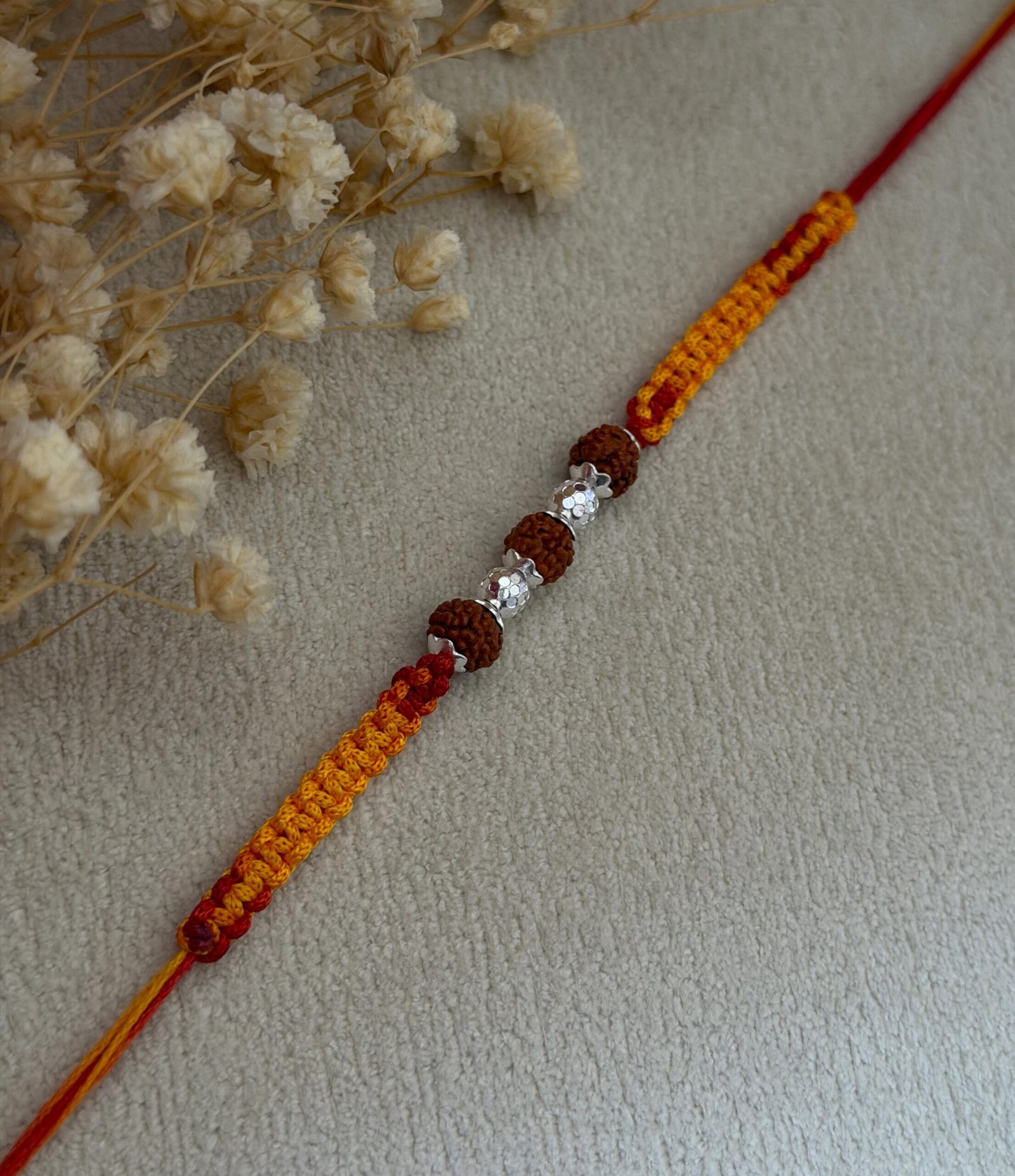 3 Rudraksha Rakhi with Diamond-Cut CNC Silver Bead red - Image 4