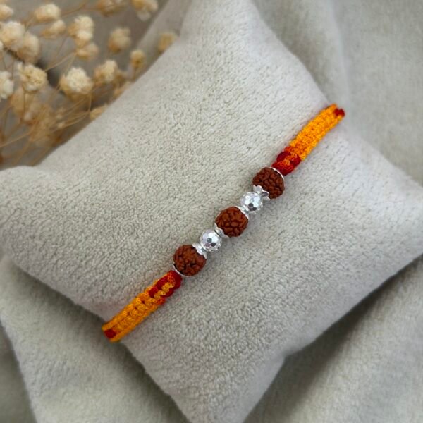 3 Rudraksha Rakhi with Diamond-Cut CNC Silver Bead red