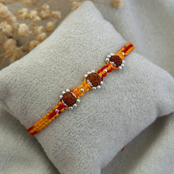 Silver rudraksha floral rakhi moli