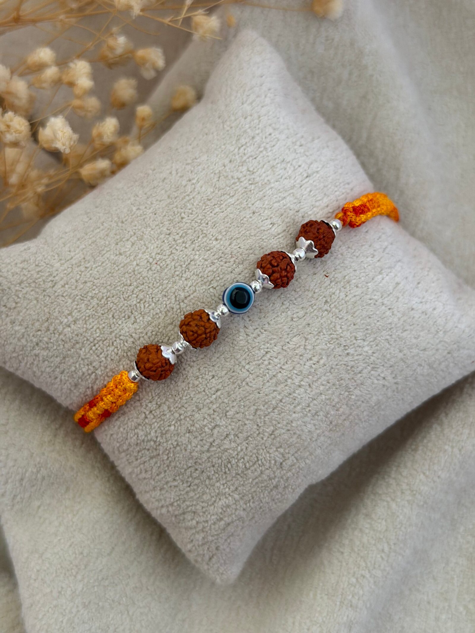 Rudraksha Evil eye silver rakhi