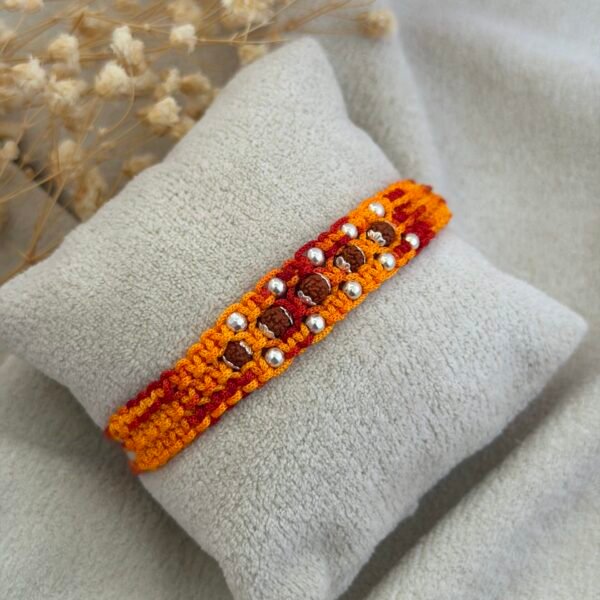 5 rudraksha wide strip red silver rakhi