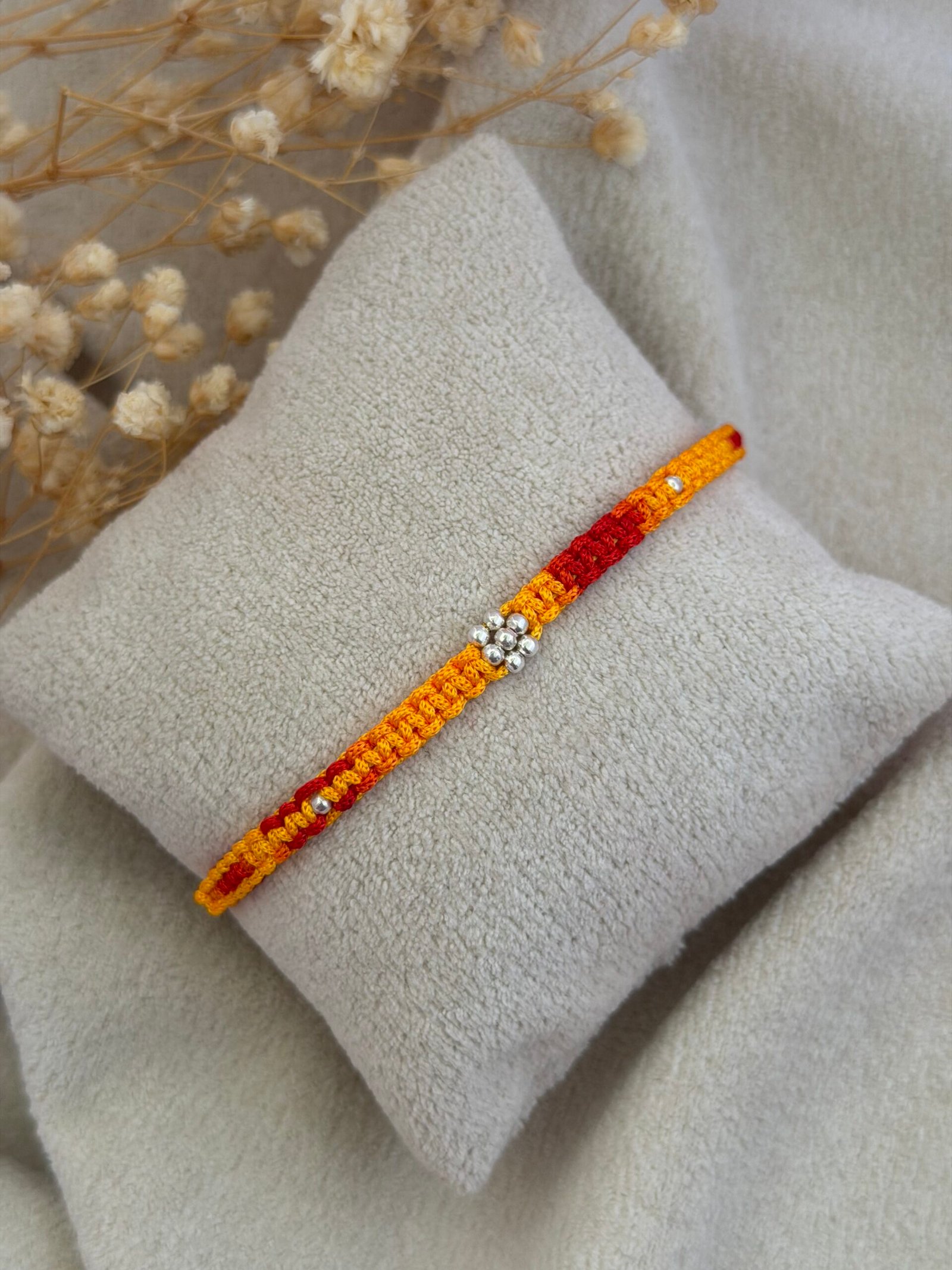 floral moli silver rakhi