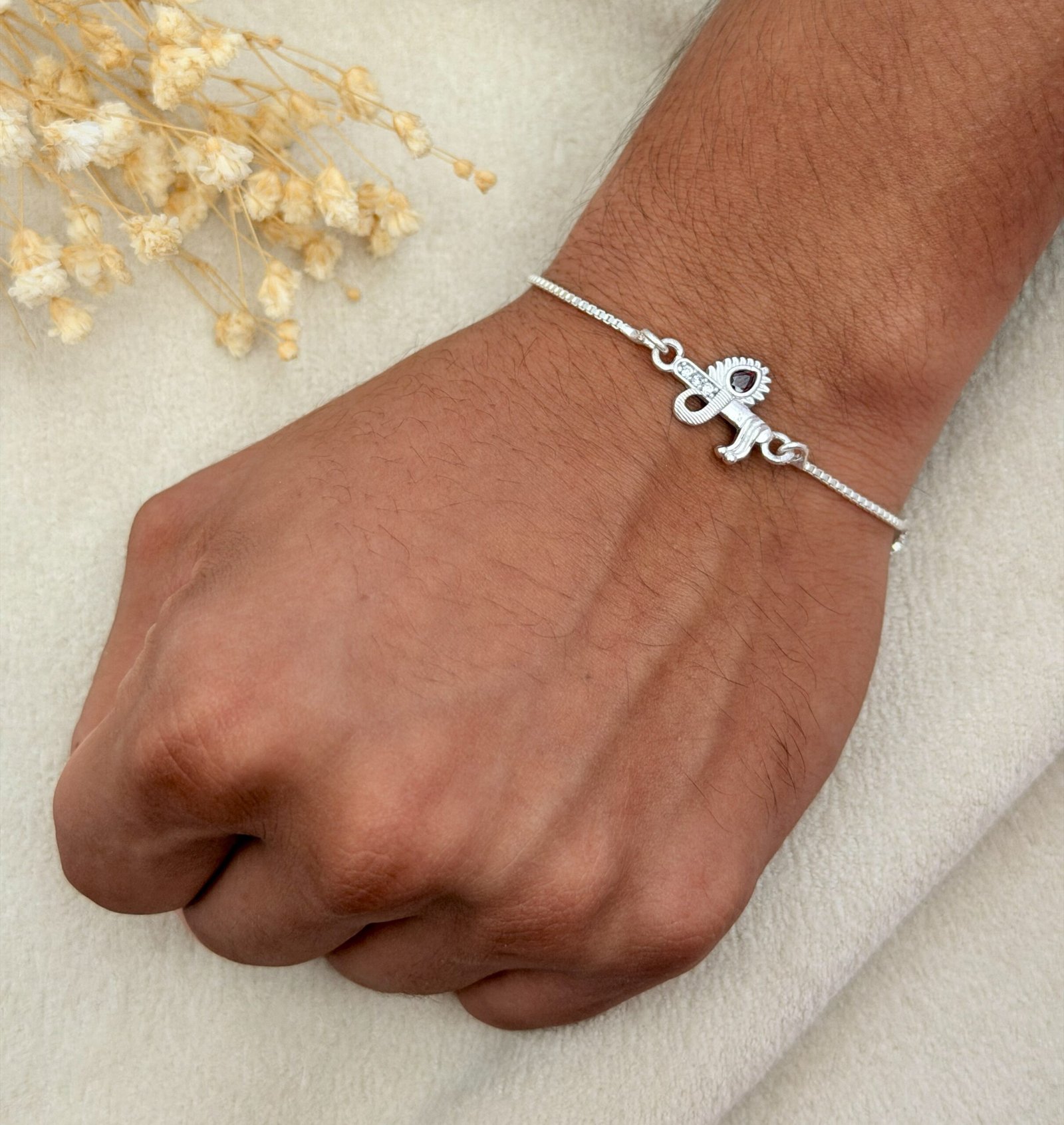 Krishna Flute Silver Chain Rakhi - Image 2