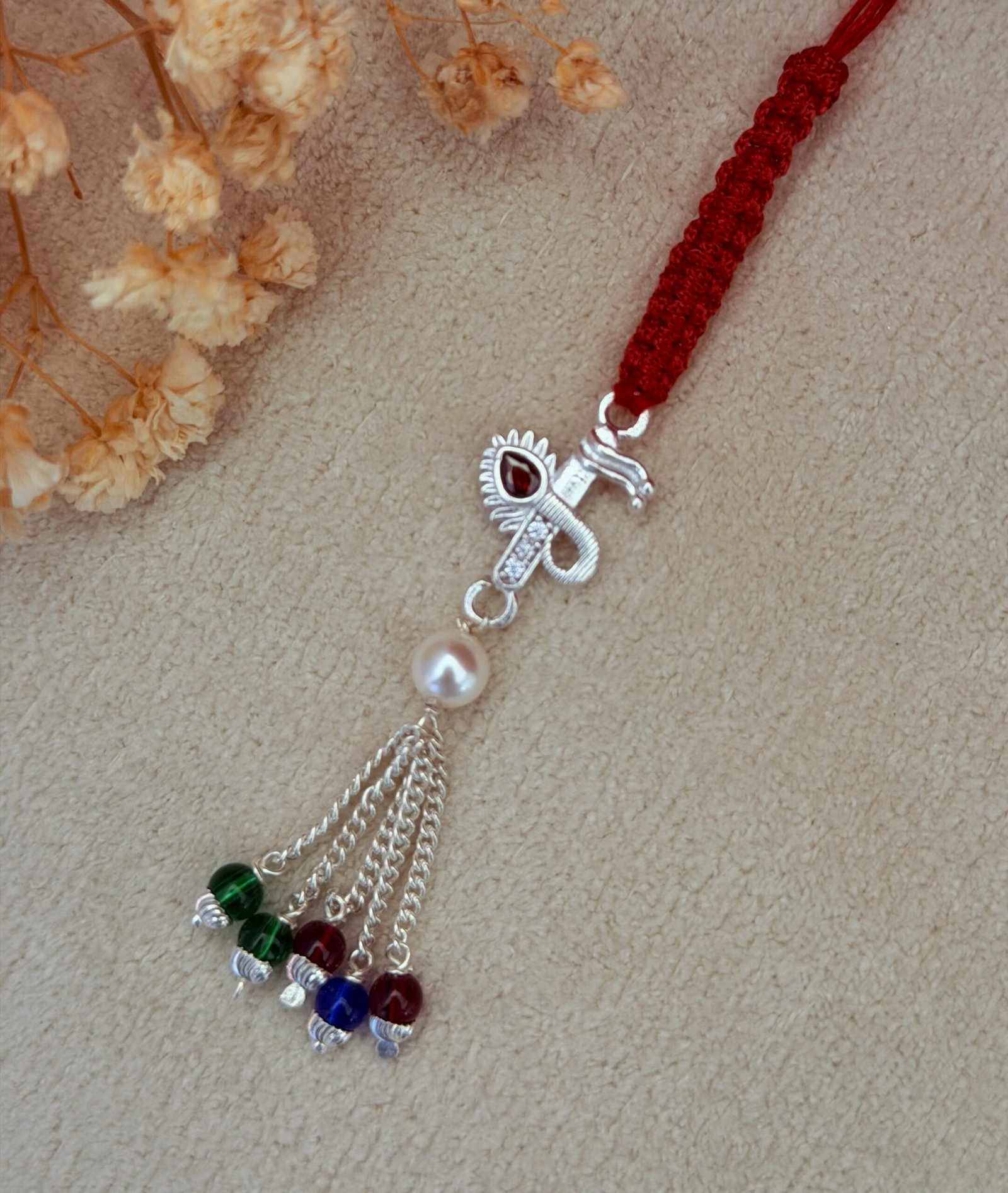 Krishna Flute Silver Chuda Rakhi - Image 2