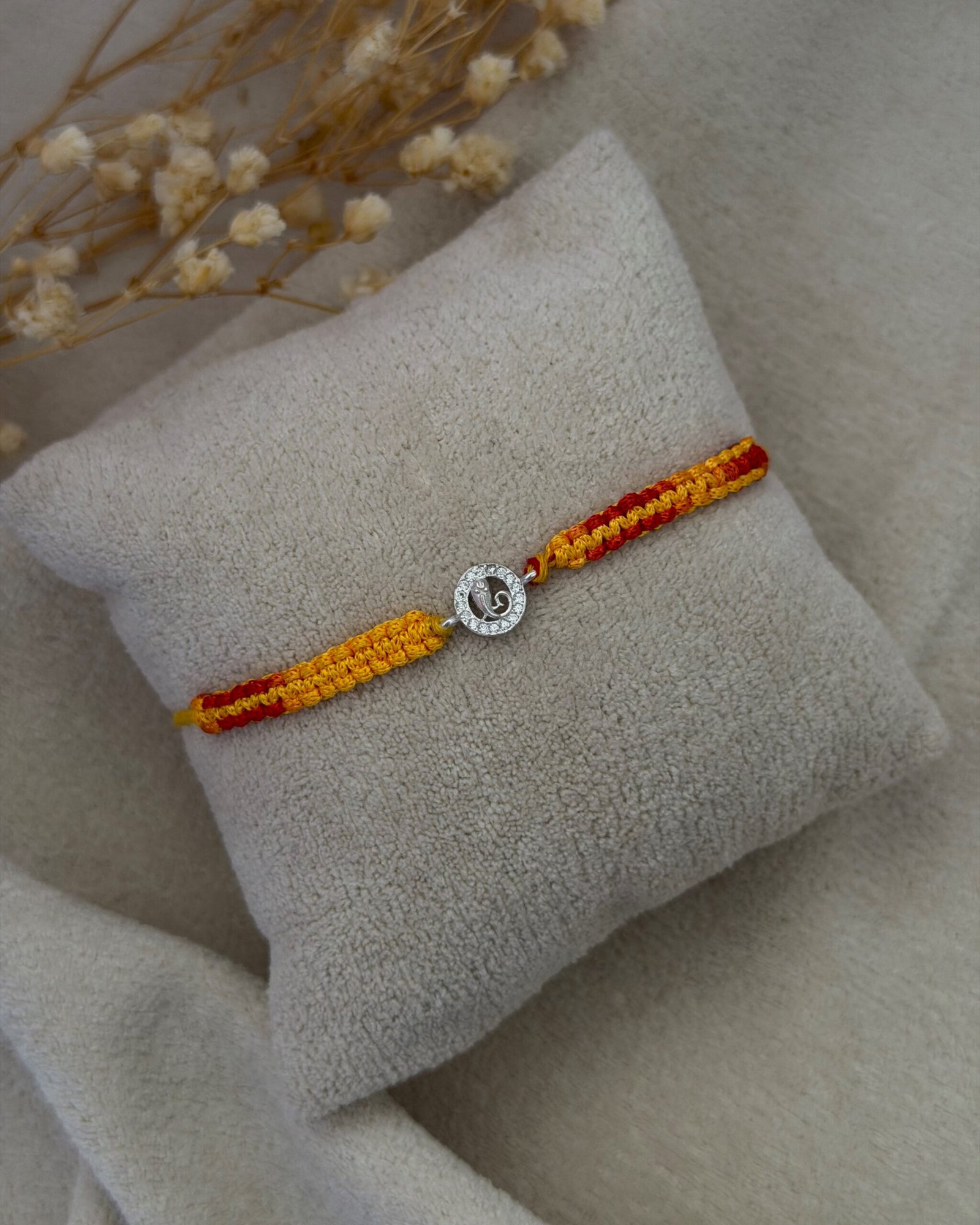 Micro ganesha silver rakhi