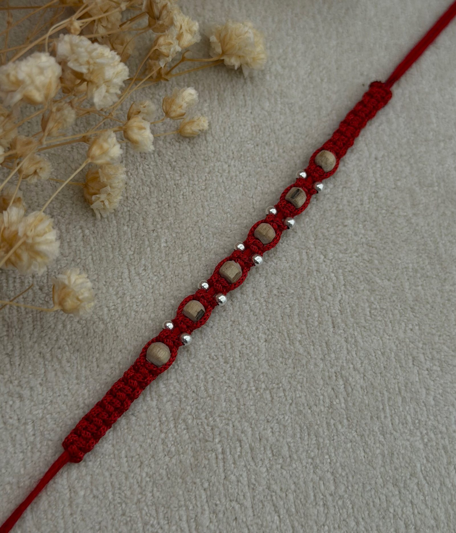 Tulsi beads red silver rakhi - Image 4
