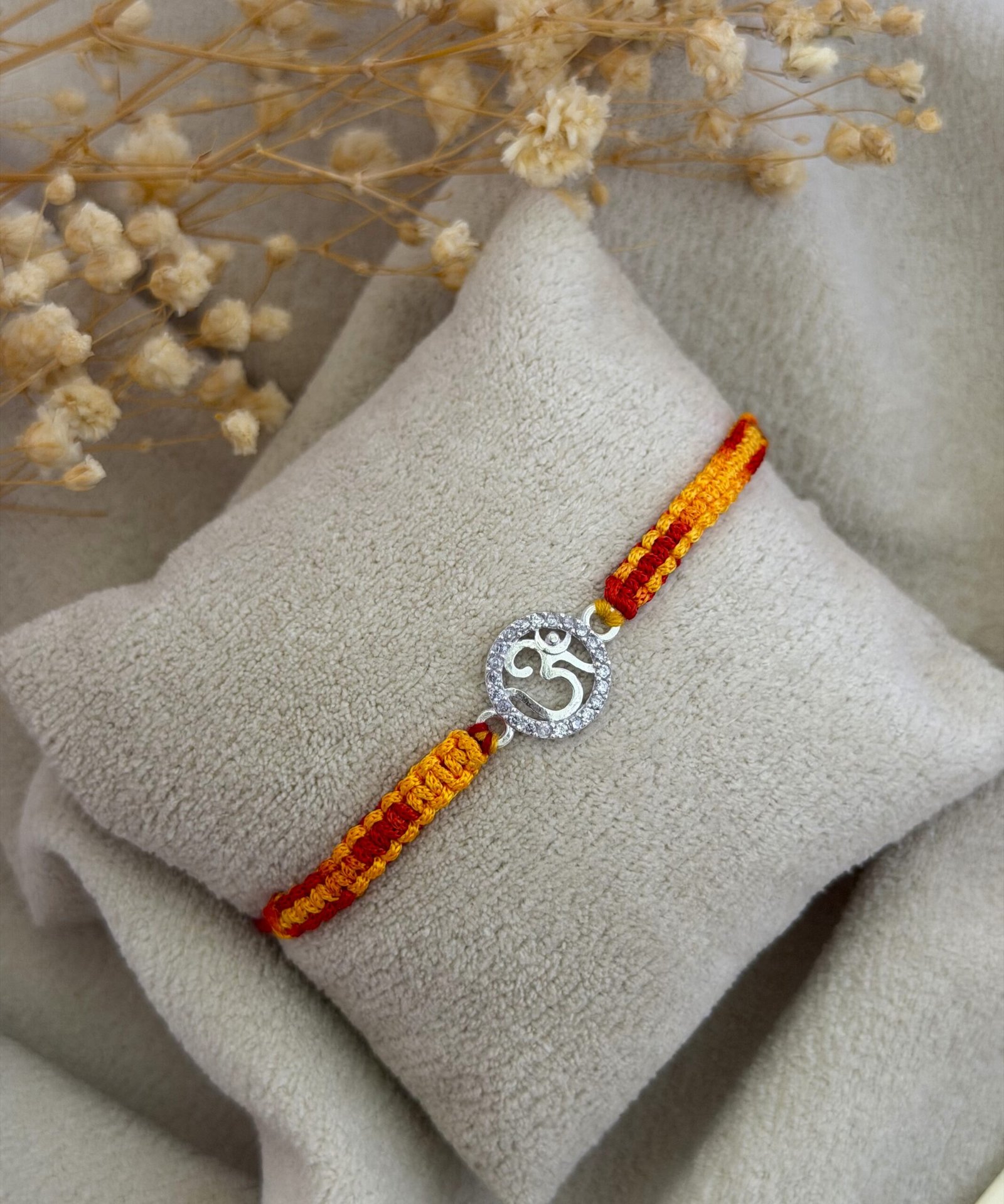 Om cz silver rakhi