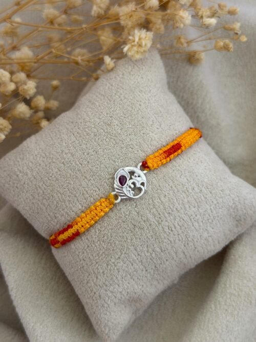 Om more pankh silver rakhi