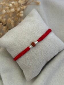 Single rudraksha red silver rakhi