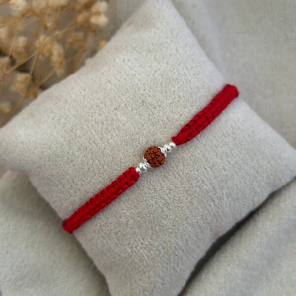 Single rudraksha red silver rakhi