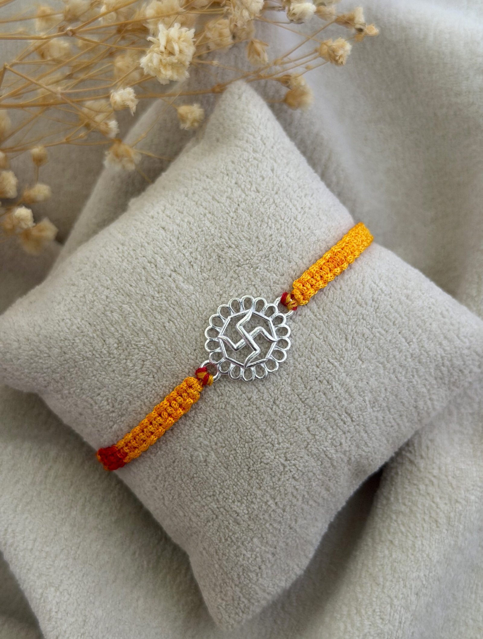 Swastik silver rakhi