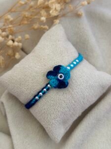 Evil eye Crochet Flower Silver Rakhi