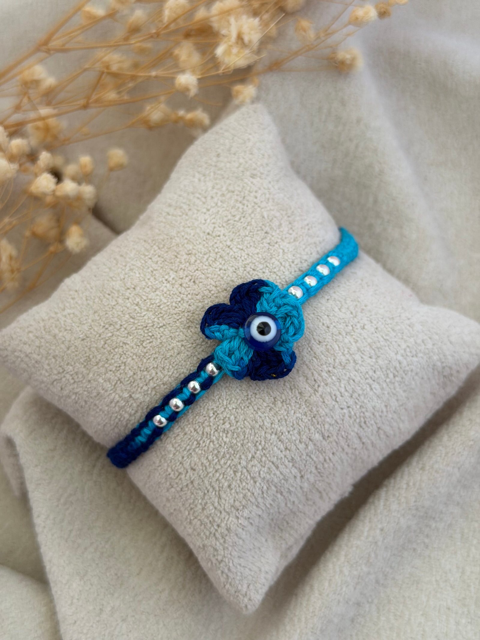 Evil eye Crochet Flower Silver Rakhi
