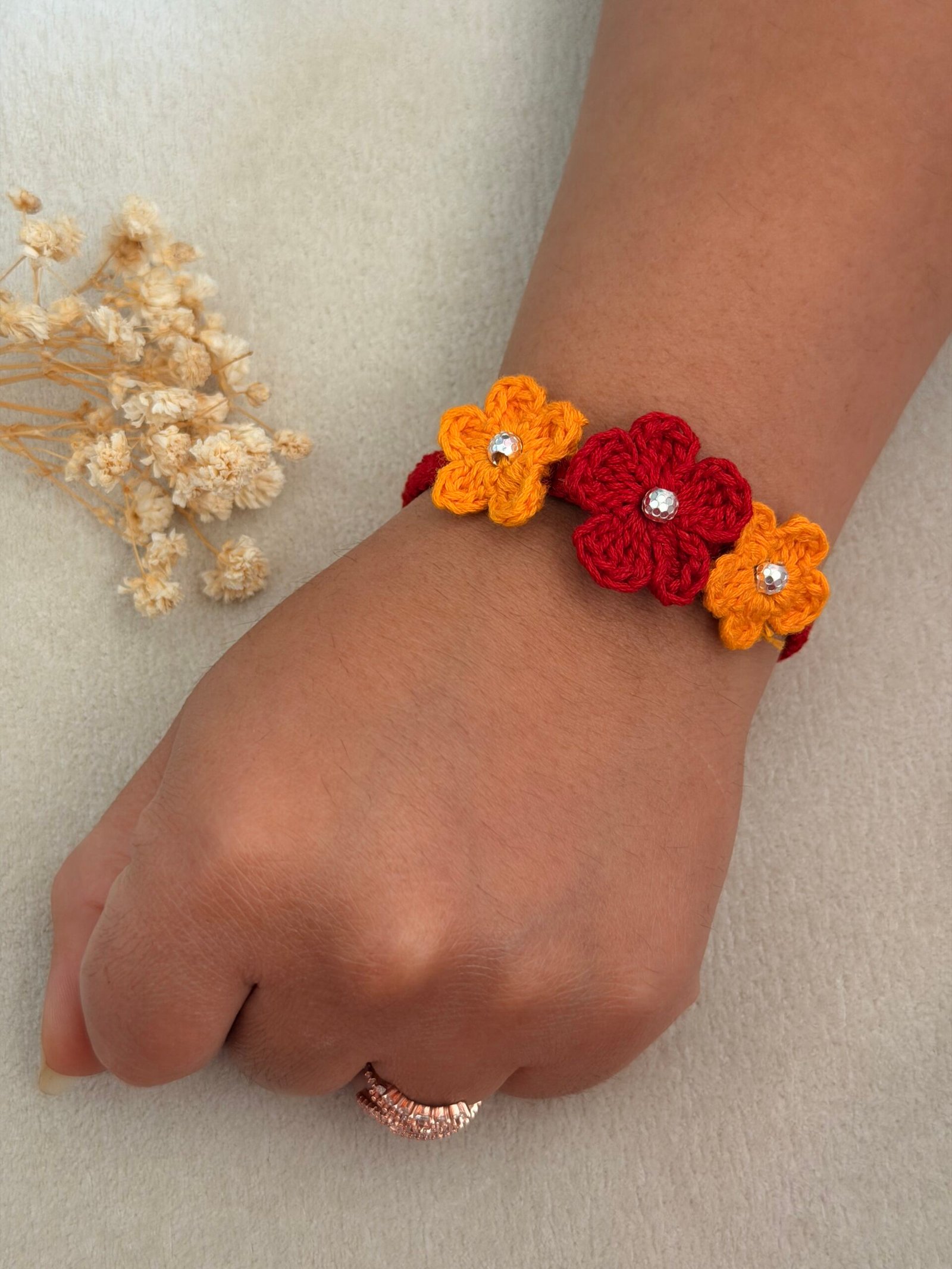 Red Yellow Crochet Flower Silver Rakhi - Image 4