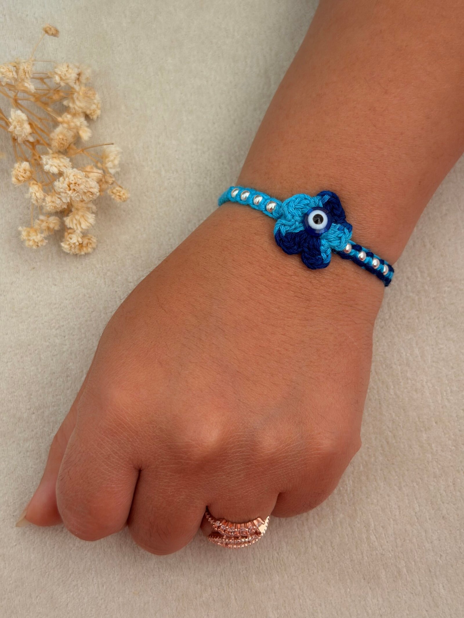 Evil eye Crochet Flower Silver Rakhi - Image 4