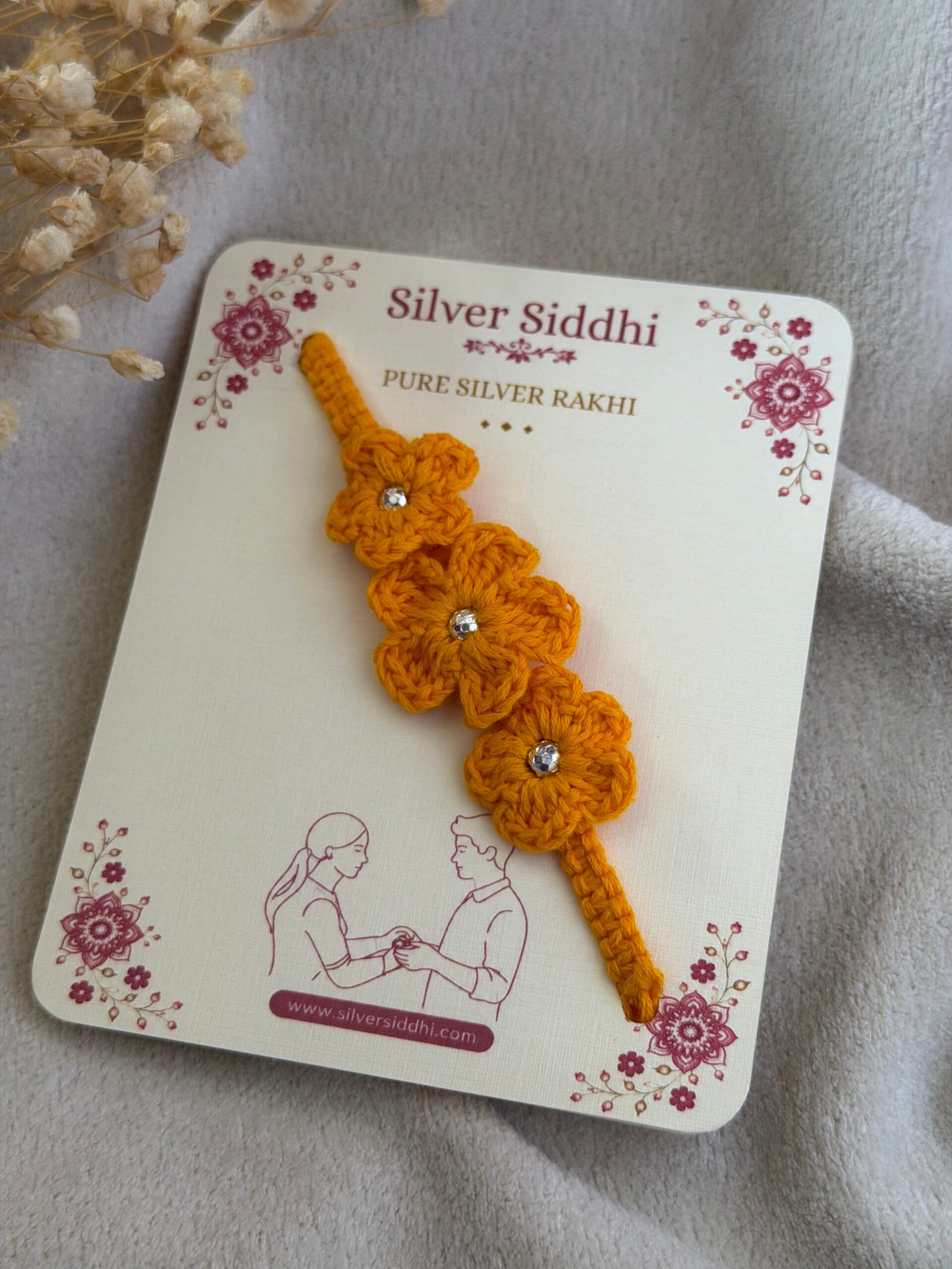 Yellow Crochet Flower Silver Rakhi - Image 3